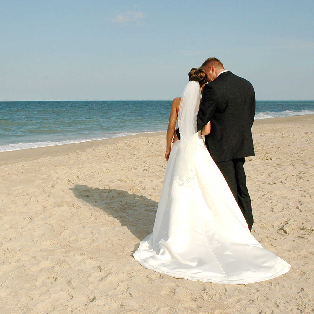 Wedding photography on beach Sanderling Resort
