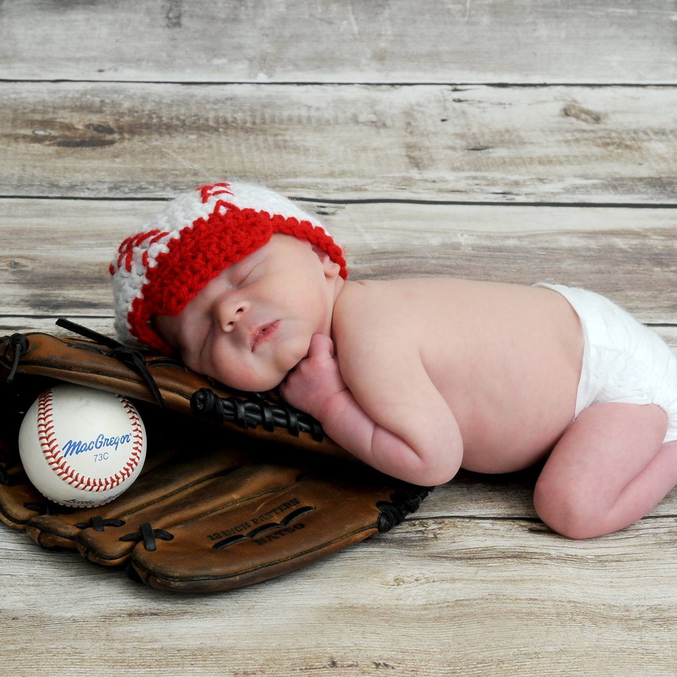 Baby boy newborn photo with baseball